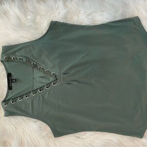 Green Sleeveless Blouse with Metallic Eyelet Detail
